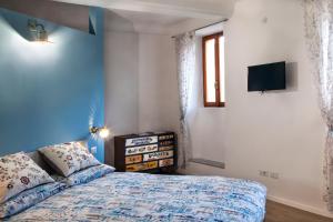 Postel nebo postele na pokoji v ubytování Al Rost B&B