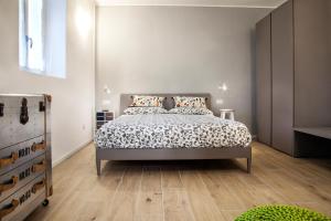 Postel nebo postele na pokoji v ubytování Al Rost B&B