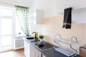 Kuchyň nebo kuchyňský kout v ubytování Hostel Zakątek ulica Grunwaldzka