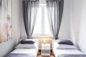 Postel nebo postele na pokoji v ubytování Hostel Zakątek ulica Grunwaldzka