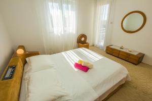 Posteľ alebo postele v izbe v ubytovaní Mimmi apartment