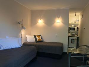Kuchyň nebo kuchyňský kout v ubytování Edelweiss Motel