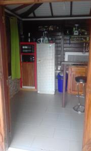 A kitchen or kitchenette at Gite Manmans
