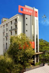 a building with a sign on top of it at The Royal Orchid Hotel, Chembur in Mumbai