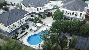 an aerial view of a large house with a swimming pool at Godiva Villa Phu Quoc in Phu Quoc