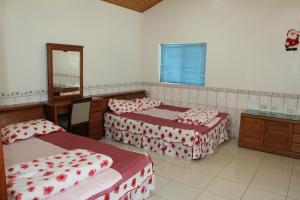 Katil atau katil-katil dalam bilik di Fei Ying Homestay