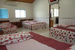 Katil atau katil-katil dalam bilik di Fei Ying Homestay
