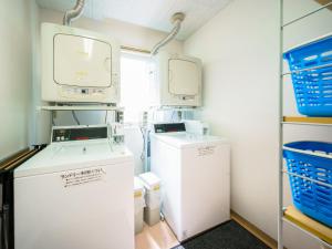 Kuchyň nebo kuchyňský kout v ubytování Super Hotel Kochi