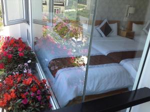 Postel nebo postele na pokoji v ubytování Mr Rot's Secret Hotel