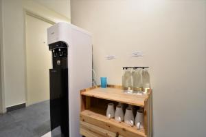 Příslušenství pro přípravu čaje a kávy v ubytování Artisan Eco Hotel