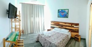 Postel nebo postele na pokoji v ubytování Casa della Nonna Polignano a mare