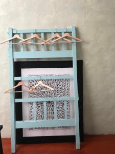 Llit o llits en una habitació de Lima.Tujoh
