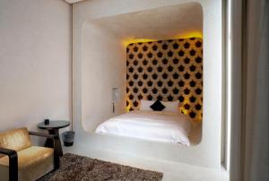 Ένα ή περισσότερα κρεβάτια σε δωμάτιο στο I DO Motel
