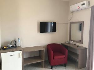 TV a/nebo společenská místnost v ubytování Blue Beach