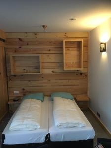 Postel nebo postele na pokoji v ubytování Studio voor 2 personen