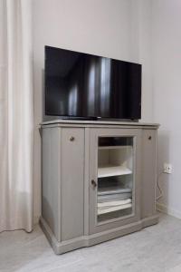 Televízia a/alebo spoločenská miestnosť v ubytovaní Casa Viana