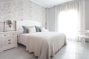 Posteľ alebo postele v izbe v ubytovaní Casa Viana