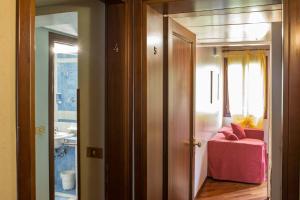 Postel nebo postele na pokoji v ubytování Hotel Piccola Fenice