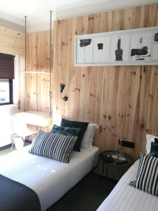 Postel nebo postele na pokoji v ubytování Hotel Umu