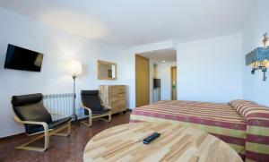 TV a/nebo společenská místnost v ubytování Hotel Apartamentos Bajondillo