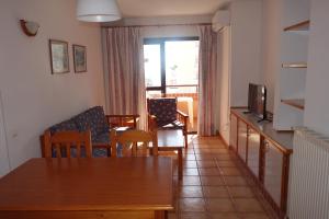 Кът за сядане в Apartamentos Estrella De Mar