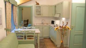 Kuchnia lub aneks kuchenny w obiekcie Residence Au Vieux Grenier