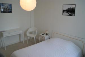 Ein Bett oder Betten in einem Zimmer der Unterkunft Le Lurton