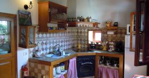 Kuchyň nebo kuchyňský kout v ubytování La Casa de Mis Padres + 3 fotografie