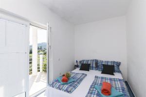 Katil atau katil-katil dalam bilik di Apartments Irena