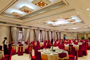 A restaurant or other place to eat at Dunhuang Hotel