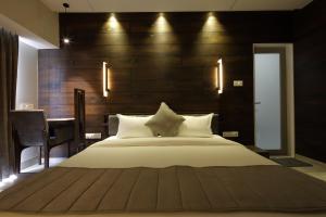 Hotel Carrefour客房内的一张或多张床位