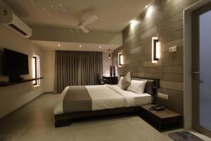 Hotel Carrefour客房内的一张或多张床位