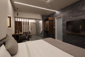 Hotel Carrefour的电视和/或娱乐中心