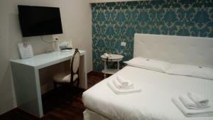 Antico Hotel Moderno客房内的一张或多张床位