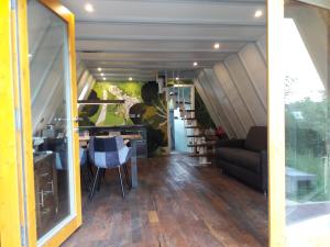 a view of the living room of a tiny house at Wolfseeweg 11 in Schellbronn