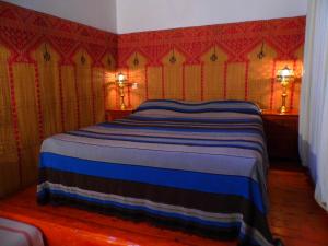 Postel nebo postele na pokoji v ubytování Riad A La Belle Etoile
