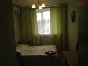 
Кровать или кровати в номере Hotel Tikhiy Ugolok
