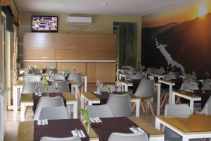 En restaurant eller et spisested på Beleza Serra Guide Hotel