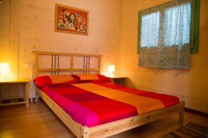 Säng eller sängar i ett rum på Camping OASI