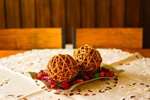 a table with a plate with two balls on it at Cabañas Cerro Zapata in Puerto Natales