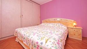 Ein Bett oder Betten in einem Zimmer der Unterkunft Apartment Ljubica