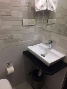 Koupelna v ubytování Hotel Antique - Colaba