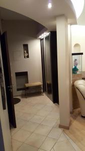 Vonios kambarys apgyvendinimo įstaigoje Asmenos apartamentai