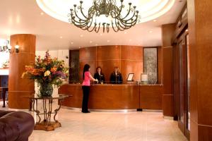 Členové personálu v ubytování Hotel Emily