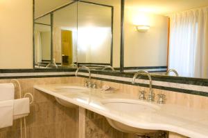 Baðherbergi á Park Hotel Villaferrata