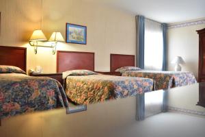 Cama ou camas em um quarto em Hotel Ram Val