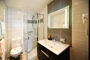 Koupelna v ubytování Appartements & Chalets Wiesenruh