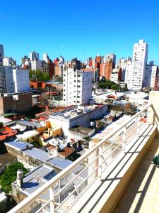 a view of a city from a balcony at Piso exclusivo en Rosario! "Altos de Rosario" in Rosario