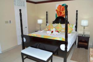 Rúm í herbergi á Franklyn D Resort & Spa All Inclusive