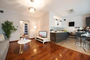 Kuchyň nebo kuchyňský kout v ubytování P&O City Center Apartments